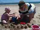 On the beach with Daddy in Tenby