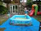 Jumping into the large paddling pool