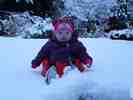 Sitting in a bumbo in the snow. 2011.